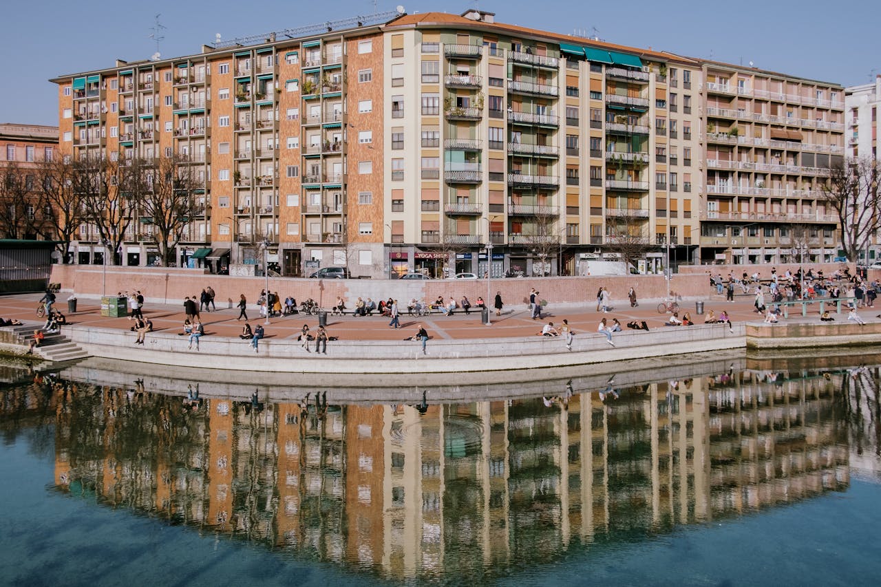 People Walking Near the River